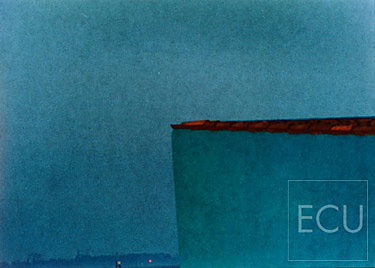 Color photo taken at dusk on the edge of the island of Burano facing the island of Torcello in Venice, Italy